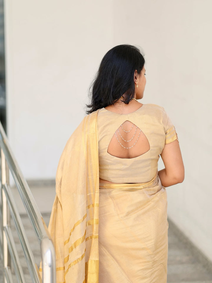 Luxury Off White Gold Kasavu Saree with Designer Tassel Pallu
