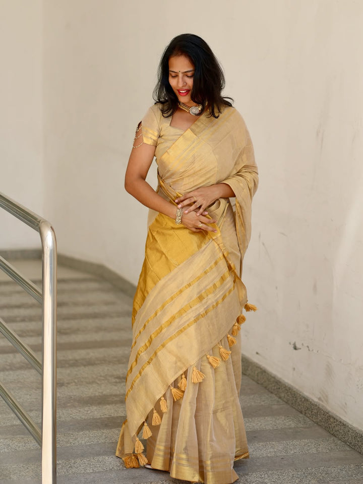 Luxury Off White Gold Kasavu Saree with Designer Tassel Pallu