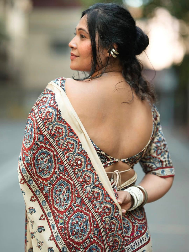 Ivory Modal Silk Ajrakh Printed Saree with Traditional Floral Motifs, Heritage Border & Tassel Detailing