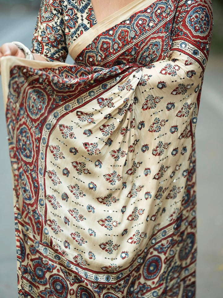 Ivory Modal Silk Ajrakh Printed Saree with Traditional Floral Motifs, Heritage Border & Tassel Detailing