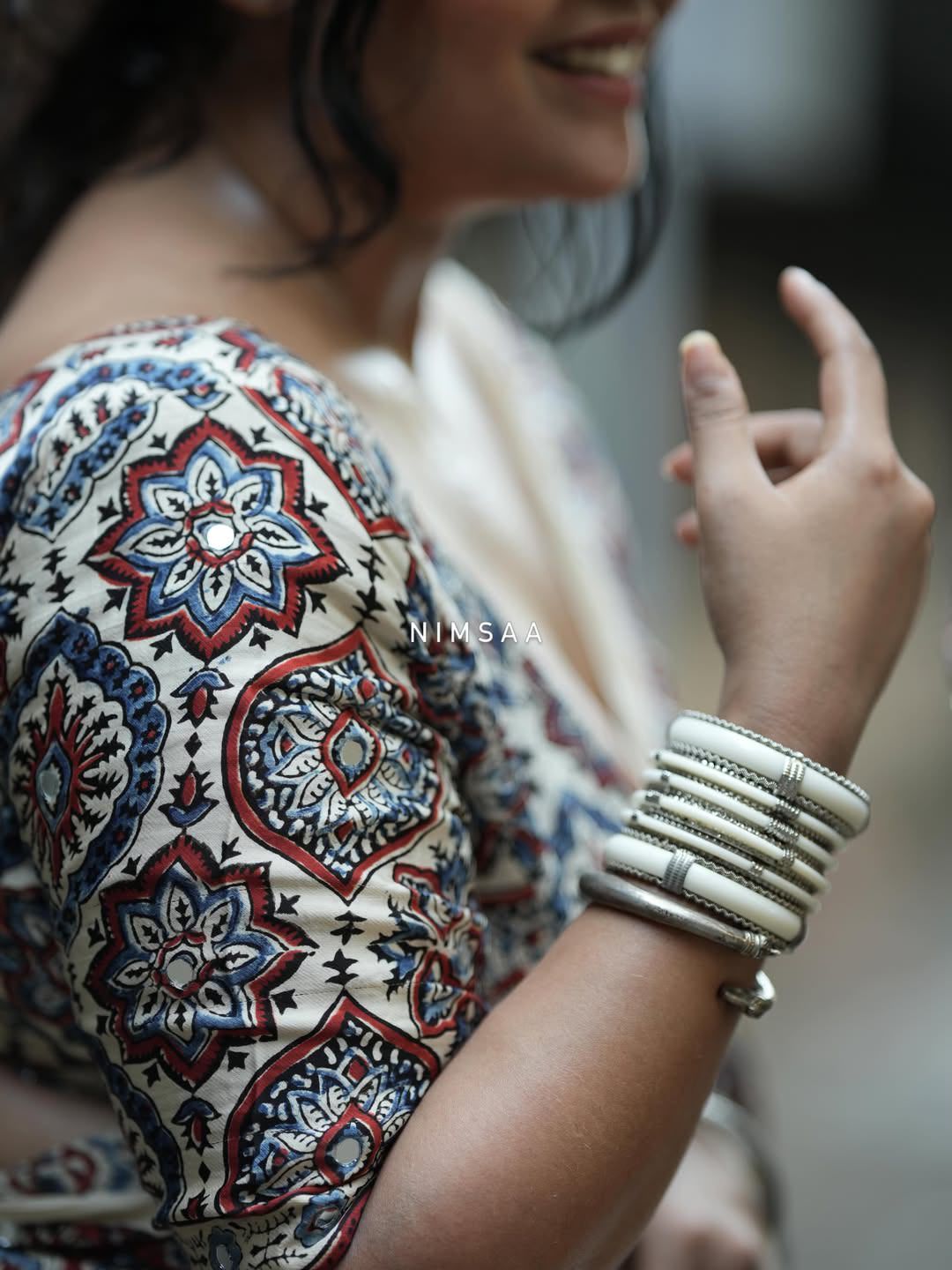 Ivory Modal Silk Ajrakh Printed Saree with Traditional Floral Motifs, Heritage Border & Tassel Detailing