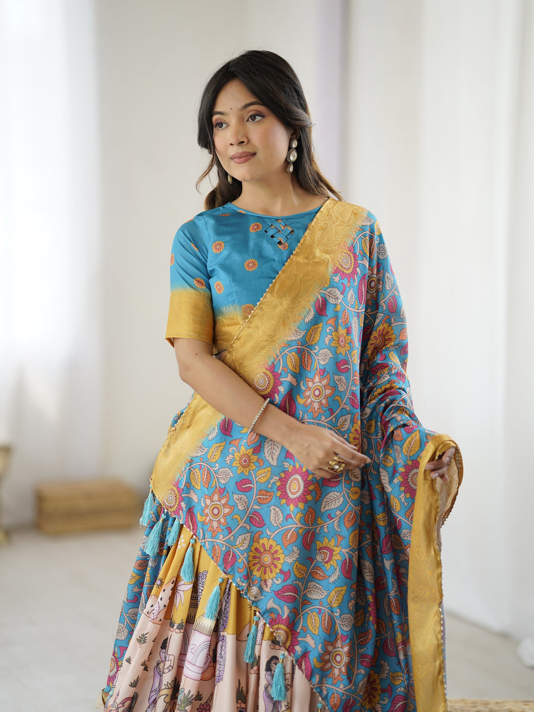 Elegant Kalamkari Lehenga in Blue and Peach with Floral Dupatta and Flared Skirt