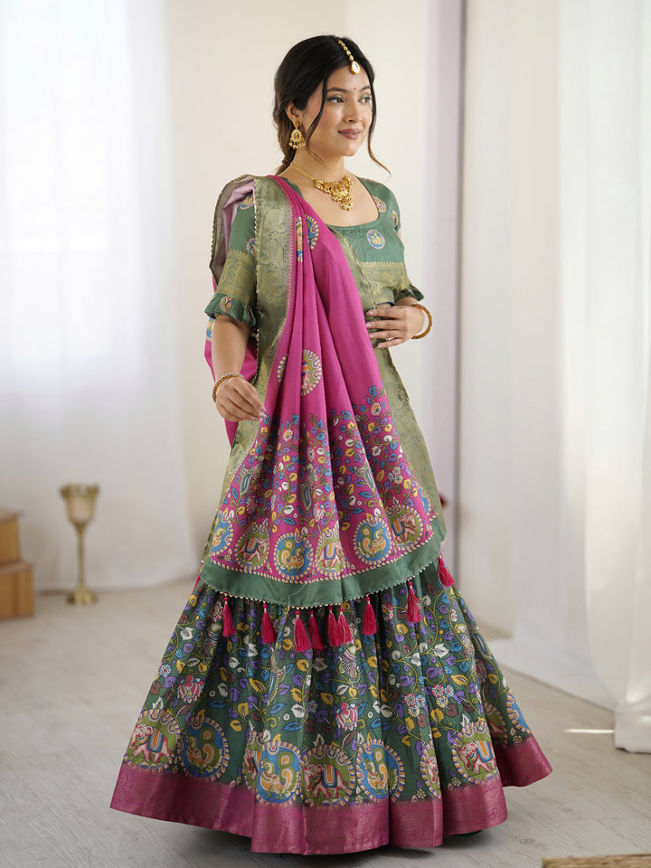 Green & Pink Kalamkari Tussar Silk Lehenga with Zari Border & Tassel Dupatta – Festive & Wedding Wear
