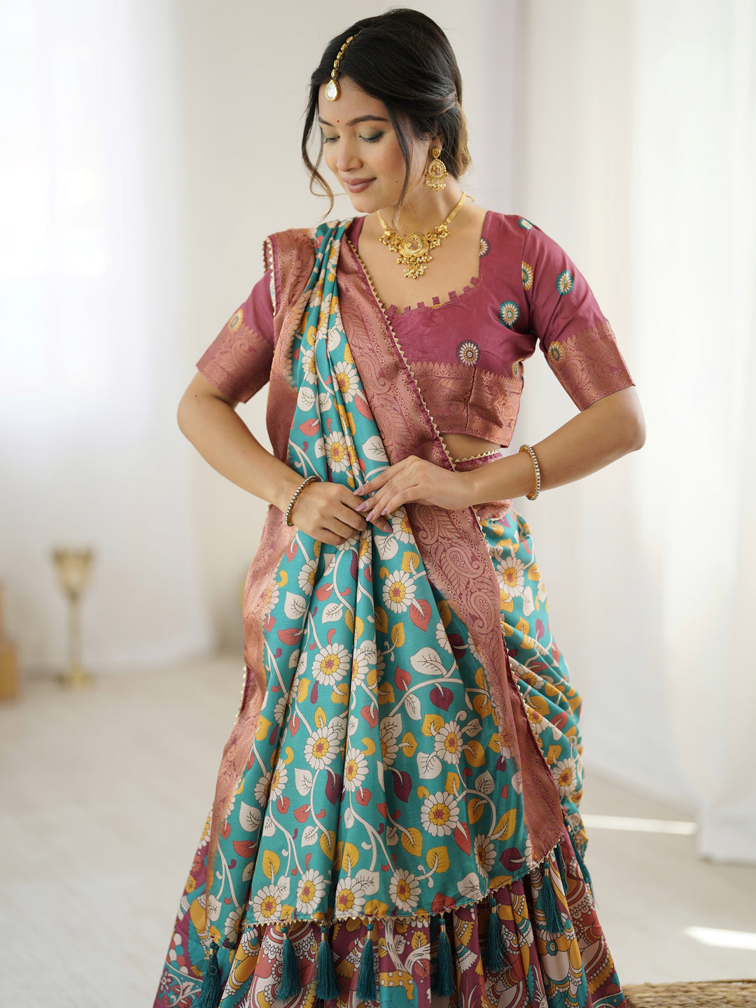 Wine & Turquoise Kalamkari Tussar Silk Lehenga with Floral Motifs, Zari Border & Tassel Dupatta – Wedding & Festive Wear