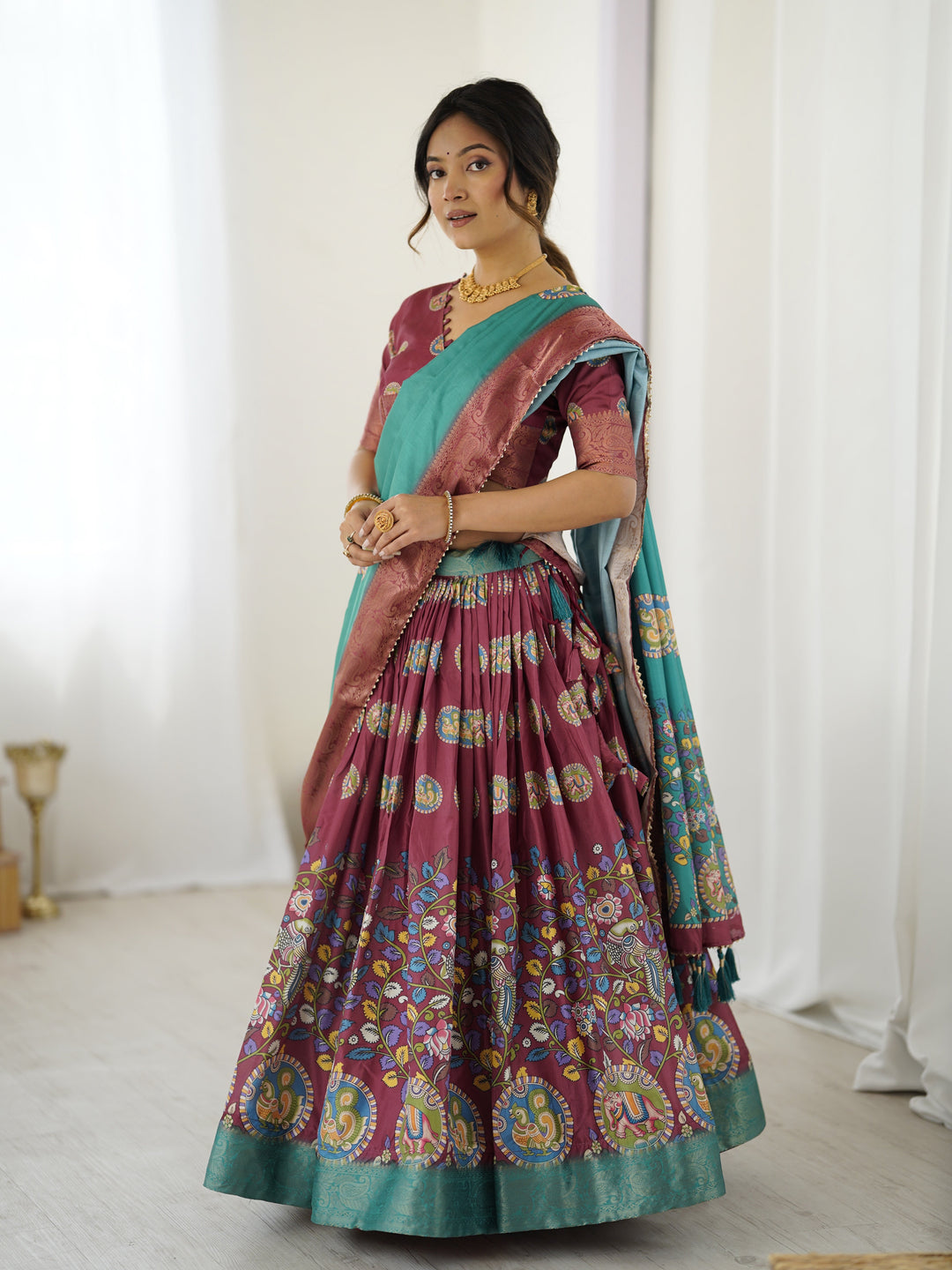 Wine & Teal Kalamkari Tussar Silk Lehenga with Zari Border & Tassel Dupatta – Festive & Wedding Wear