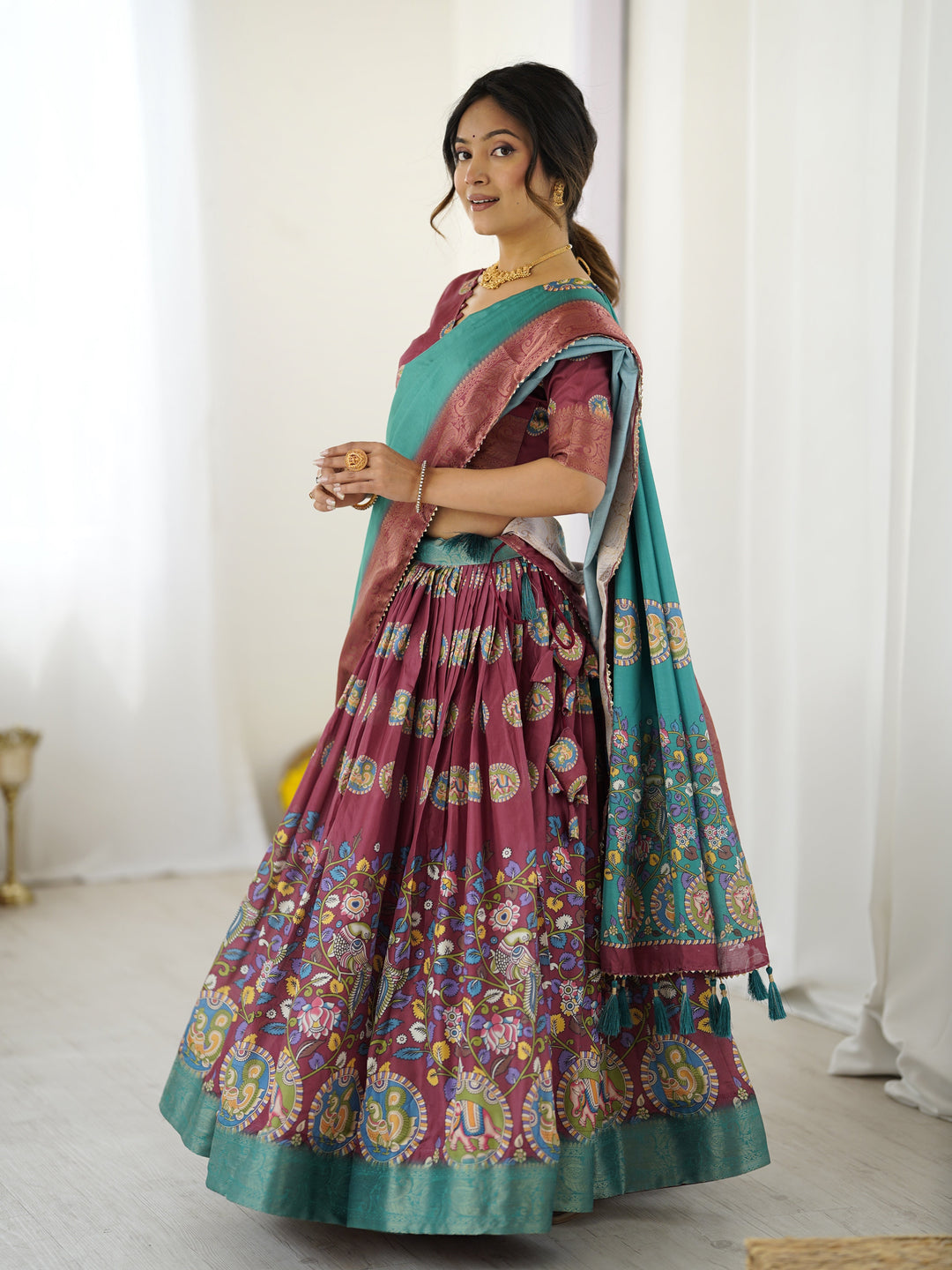 Wine & Teal Kalamkari Tussar Silk Lehenga with Zari Border & Tassel Dupatta – Festive & Wedding Wear