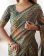 Teal Green Handloom Cotton Saree with Floral Print and Royal Elephant Pallu