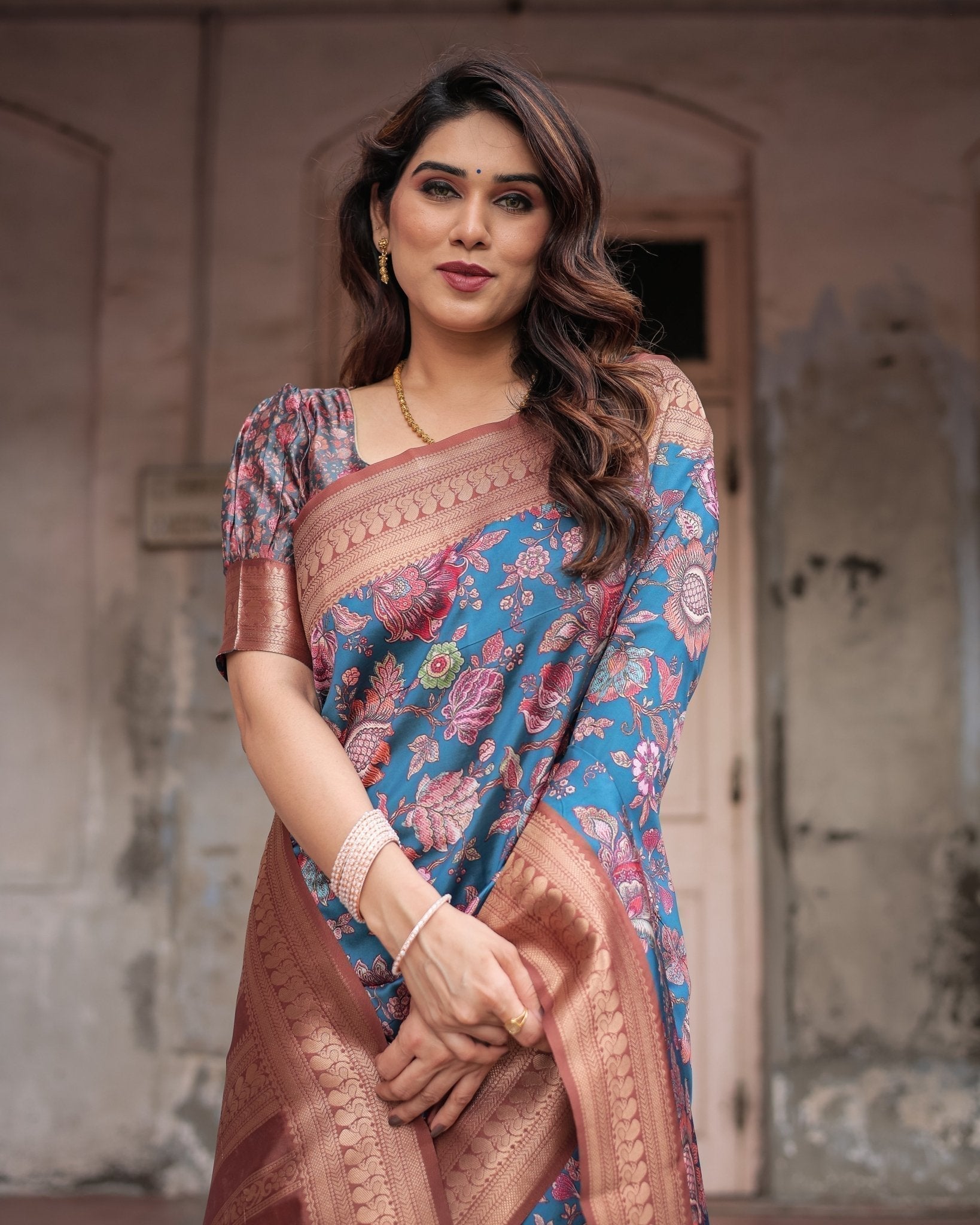 Teal Banarasi Silk Saree with Rust Zari Border and Floral Motifs