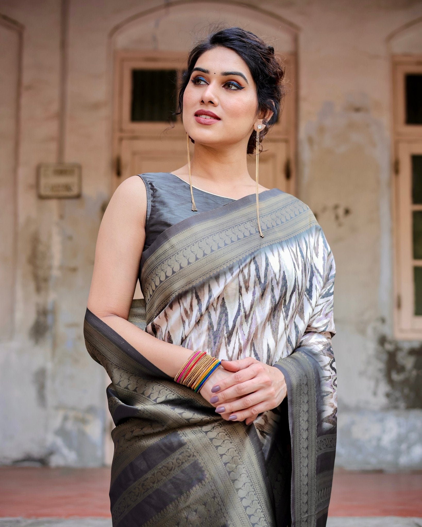Elegant Banarasi Silk Saree with Zari Weaving and Tassels in Shades of Grey and Black